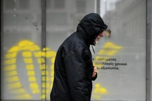 κρύο κακοκαιρία άνδρας μπουφάν