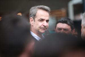Ο Κυριάκος Μητσοτάκης με μικρόφωνο