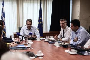 Ο Κυριάκος Μητσοτάκης και ο Άκης Σκέρτσος