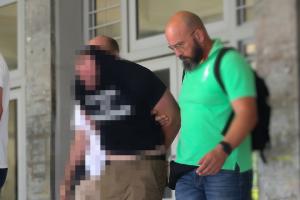 Άνθρωπος με χειροπέδες