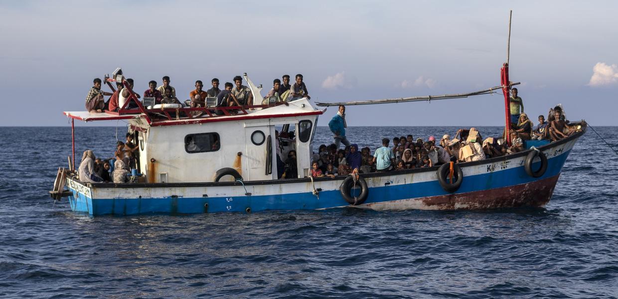 βάρκα μετανάστες