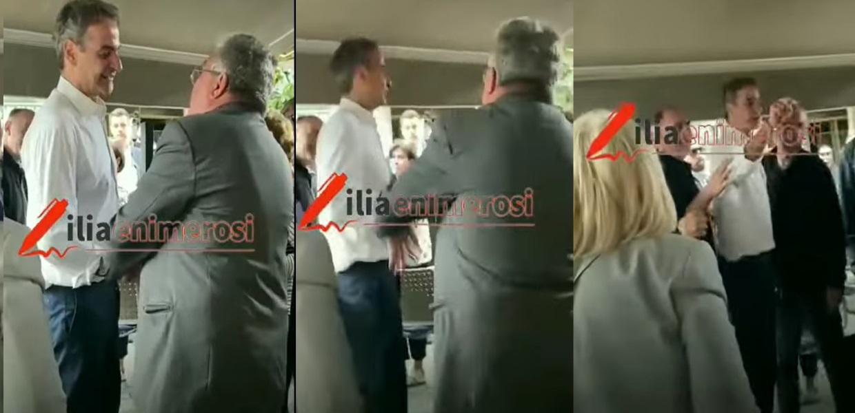 Ο Κυριάκος Μητσοτάκης συζητά με πολίτη
