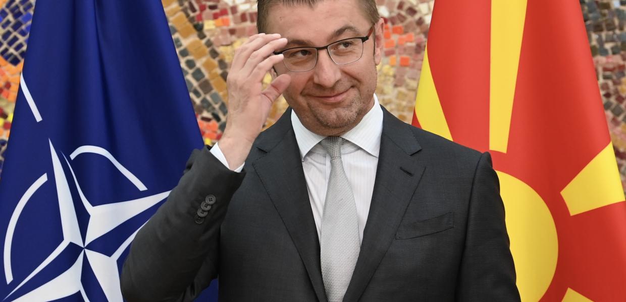 Ο εκλεγμένος Πρωθυπουργός της Βόρειας Μακεδονίας και ηγέτης του κόμματος VMRO-DPMNE, Hristijan Mickoski, αντιδρά αφού έλαβε την εντολή σχηματισμού νέας κυβέρνησης, στα Σκόπια, Δημοκρατία της Βόρειας Μακεδονίας, 06 Ιουνίου 2024. Το δεξιό κόμμα VMRO-DPMNE κέρδισε τις βουλευτικές εκλογές που πραγματοποιήθηκαν στις 08 Μαΐου 2024. 