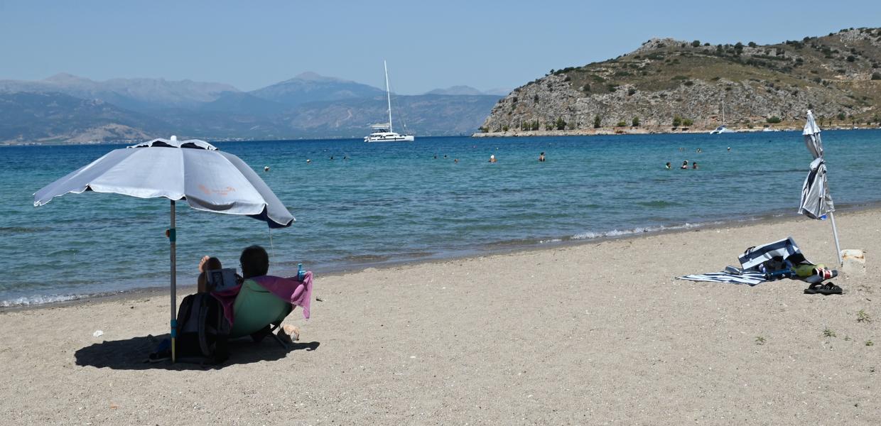 καύσωνας ζέστη καιρός καλοκαίρι θάλασσα ομπρέλα