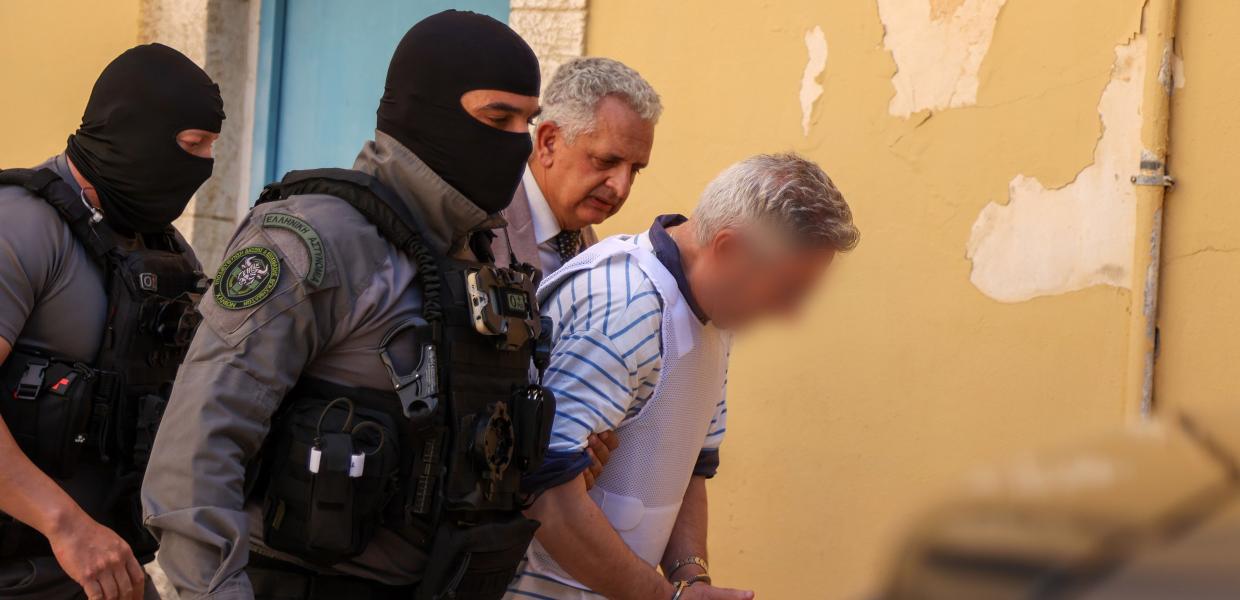 Άνθρωπος με χειροπέδες